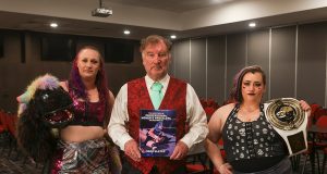 Local author tackles unique project to put spotlight on women’s wrestling