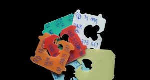 Bread tags, fruit and vegetable stickers in eye of State Government