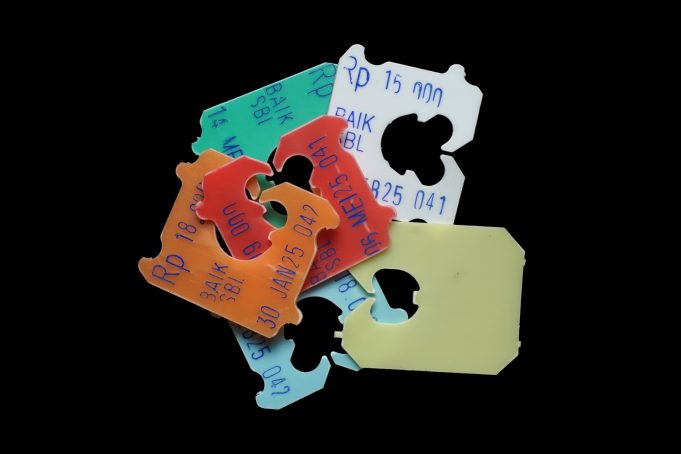 Bread tags, fruit and vegetable stickers in eye of State Government