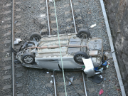 Driver’s miracle escape after car crashes on to rail tracks